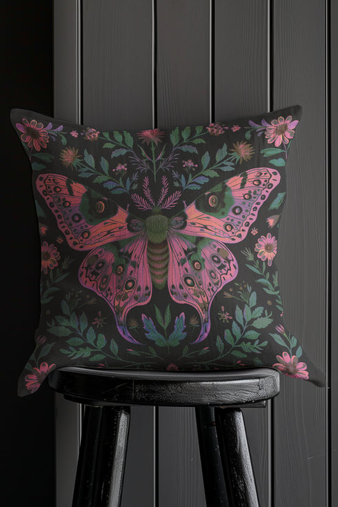 A beautifully detailed pillowcase cover featuring a vibrant moth in shades of pink, purple, and green. The moth is framed by intricate floral designs, including lush green leaves and pink flowers, all set against a dark, moody background. The design evokes a cottagecore aesthetic with gothic undertones, blending nature with a magical, whimsical vibe.